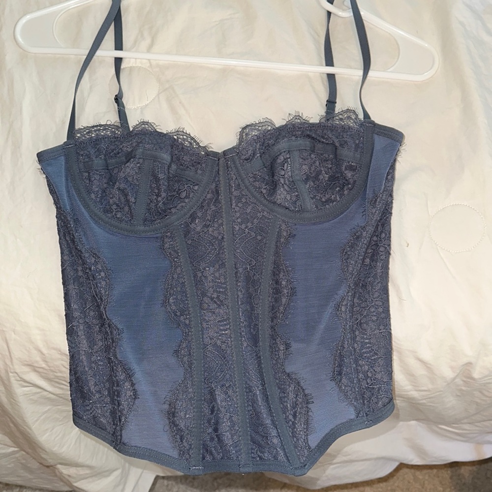 Perfect condition Urban Outfitters Corset top. Size medium. Color blue.
